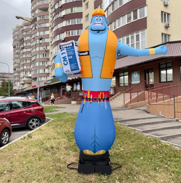 Inflatable man 340 cm with a bright design for a construction supermarket