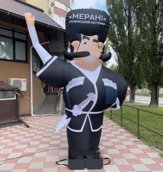 Inflatable waving Georgian man height 340 cm with fan for Georgian cuisine restaurant