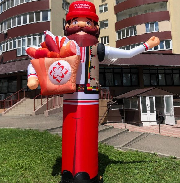 Bearded Hutsul in red Aeroman with arms 340 cm for outdoor advertising of a butcher shop