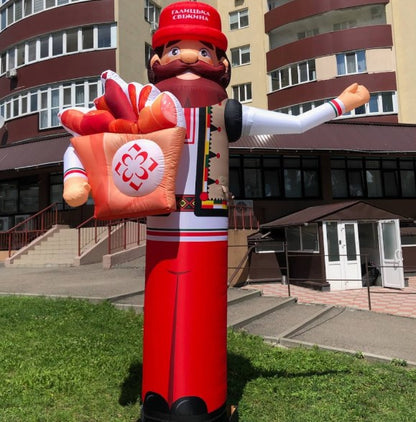 Bearded Hutsul in red Aeroman with arms 340 cm for outdoor advertising of a butcher shop