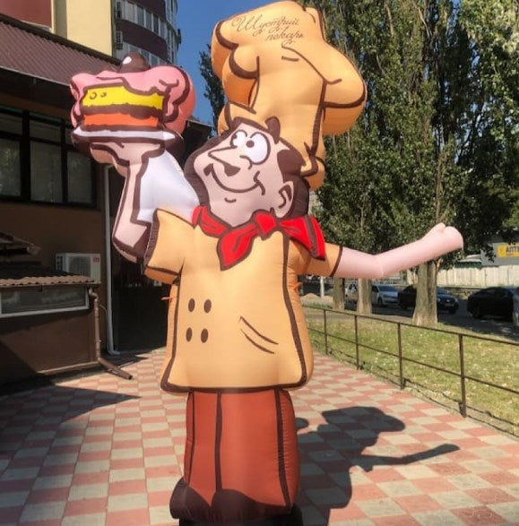 Inflatable character waving hand, Baker 340 cm with fan for outdoor advertising of bakery, pastry shop or dessert cafe