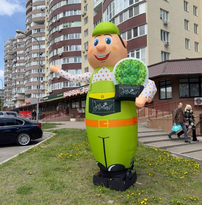 Inflatable man for gardening shop height 340 cm with waving hand