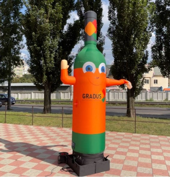 Inflatable bottle waving figure 340 cm with backlight for grocery store