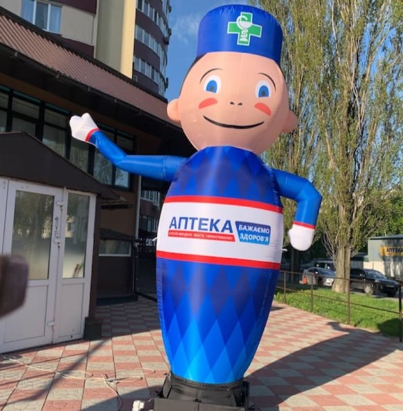 Inflatable figure Pharmacist 340 cm with waving arms for pharmacy outdoor advertising